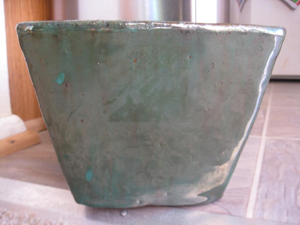 Green Pottery Planter Antiques Board